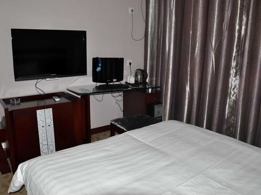 Hangjia Hotel Урумчи Экстерьер фото