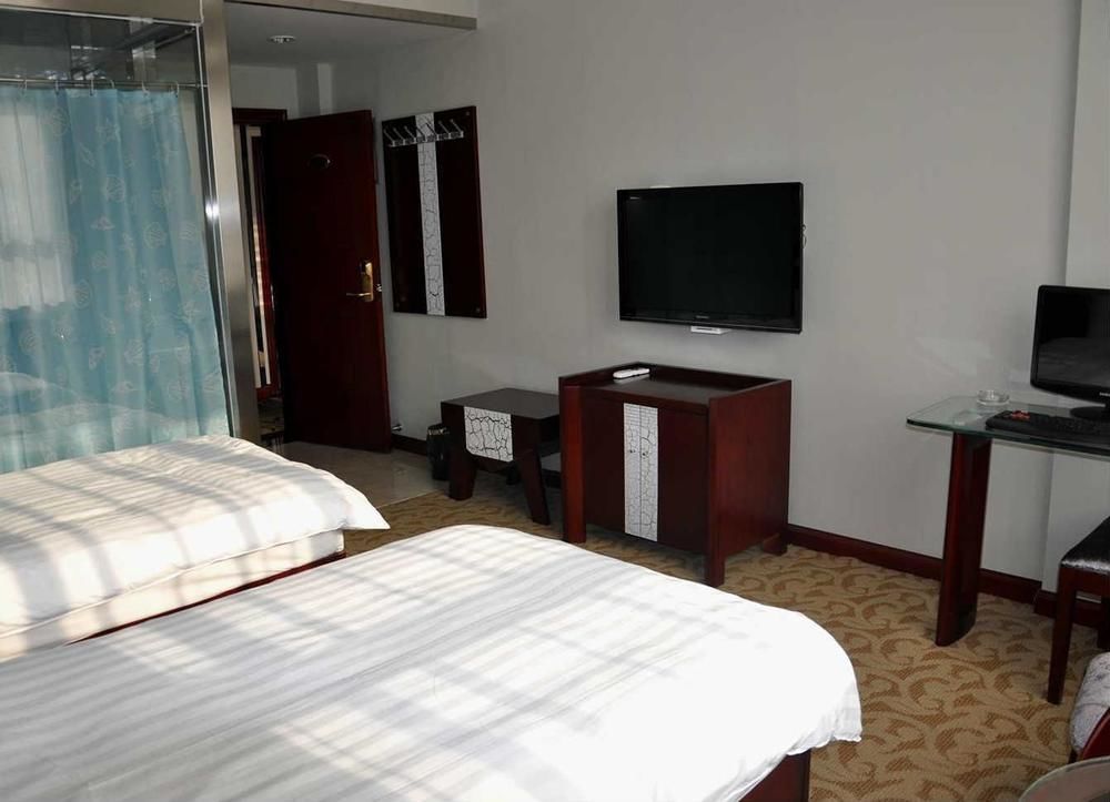 Hangjia Hotel Урумчи Экстерьер фото
