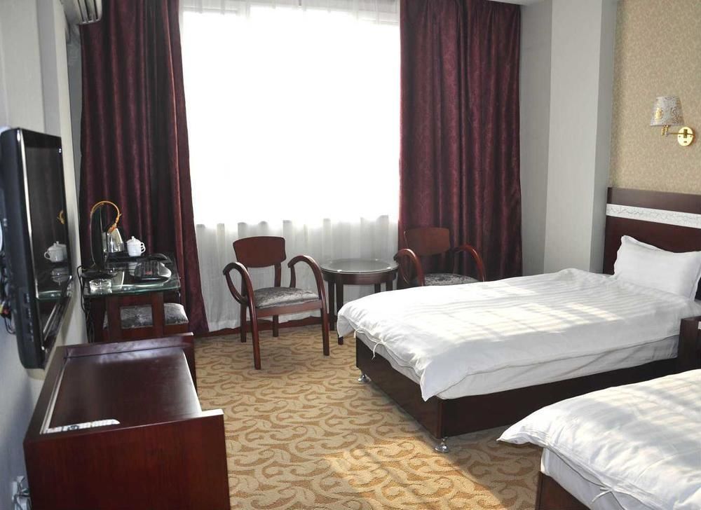 Hangjia Hotel Урумчи Экстерьер фото